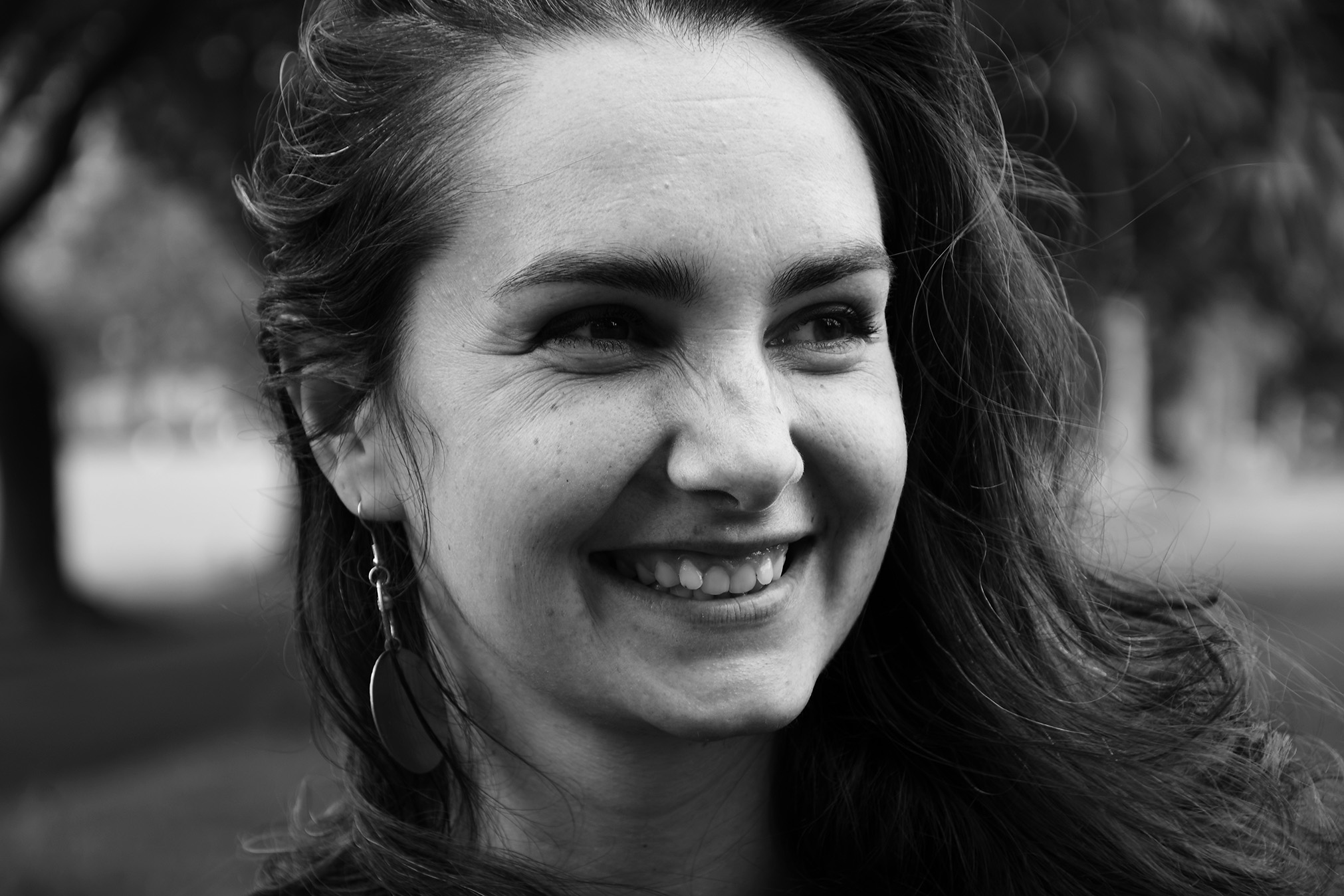 Black and white headshot of smiling actor Jelena Bašić