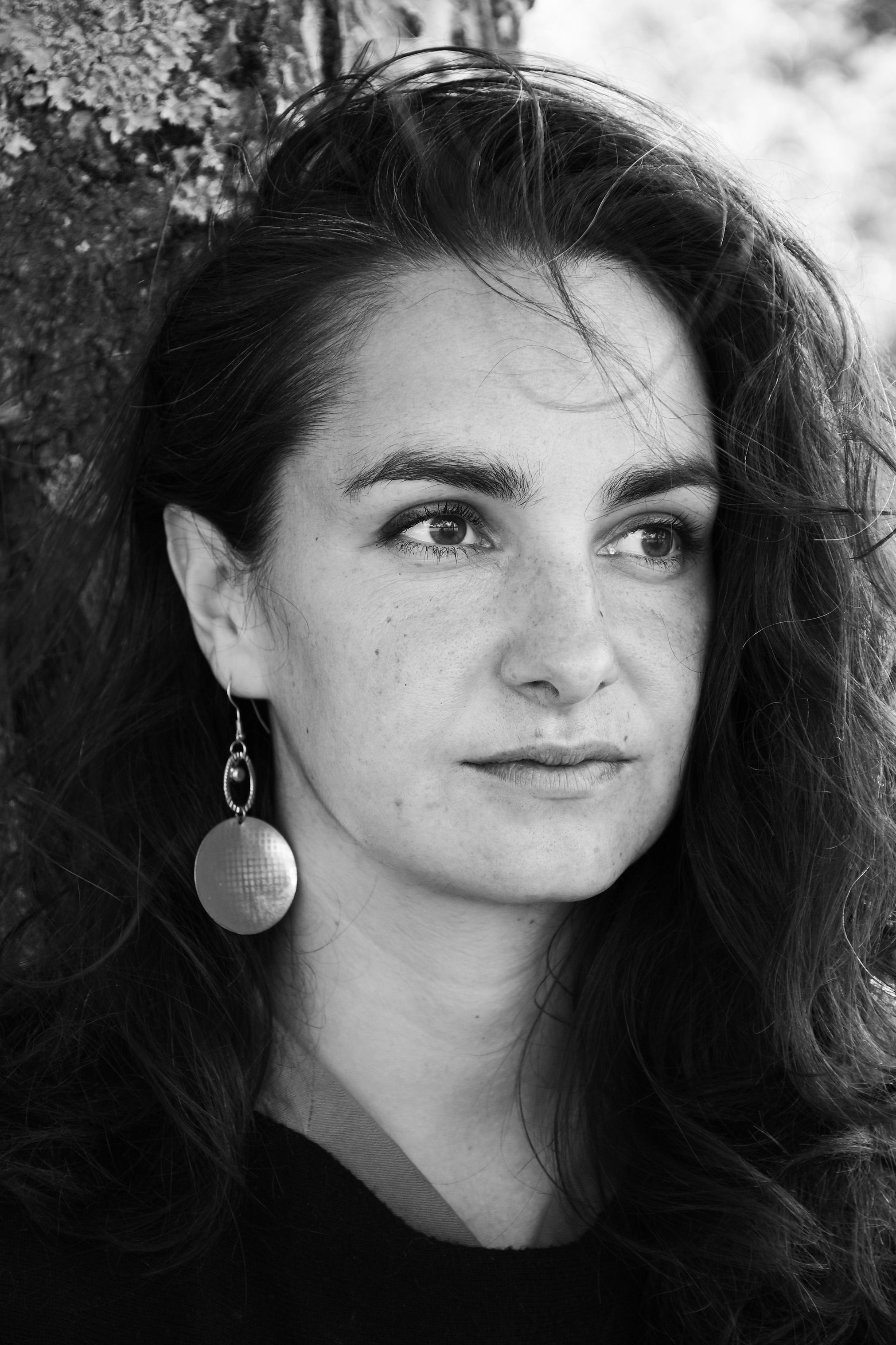 Black and white headshot of actor Jelena Bašić looking into distance